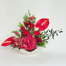 Red Flowers in Ceramic Dish